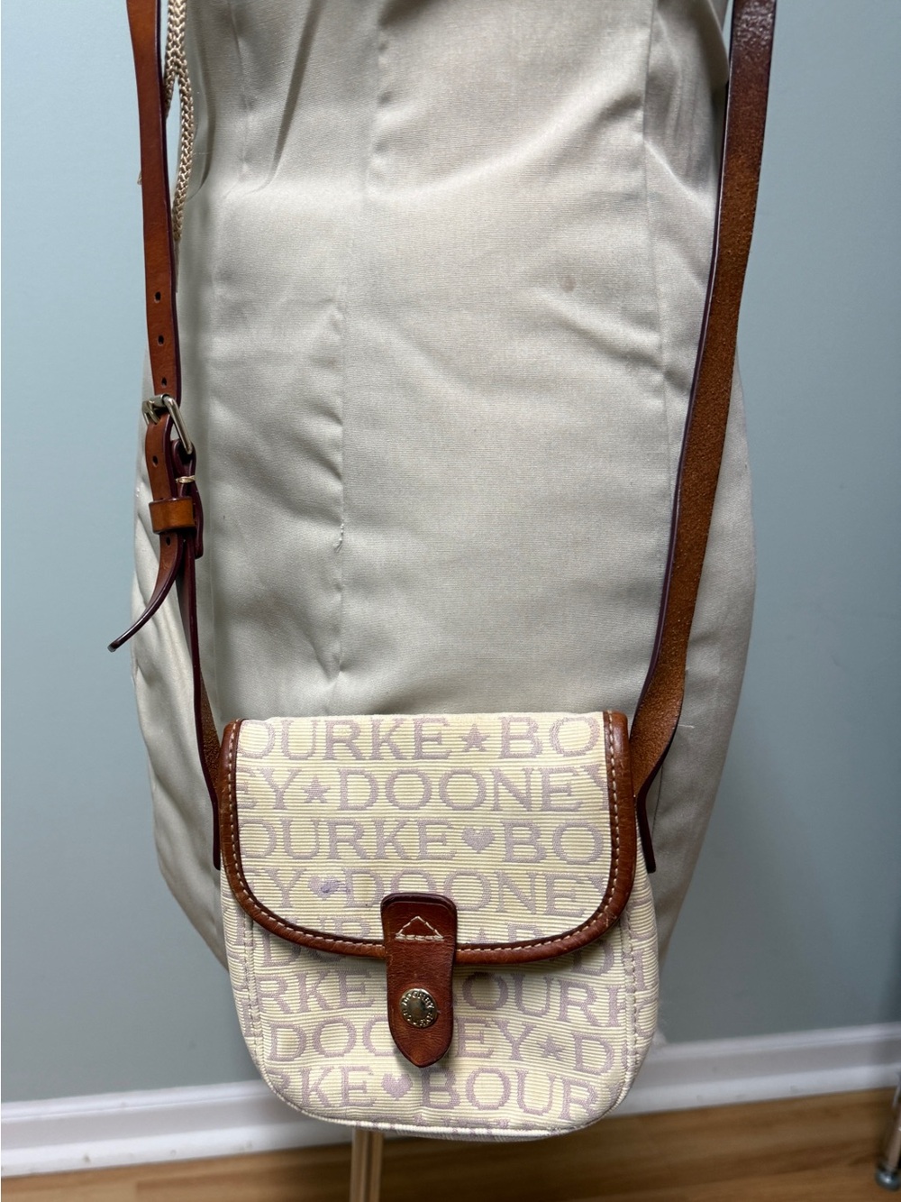Dooney & Bourke Cream Logo Crossbody with Brown Leather Strap